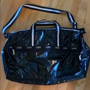 LESPORTSAC shiny black and silver medium weekender
